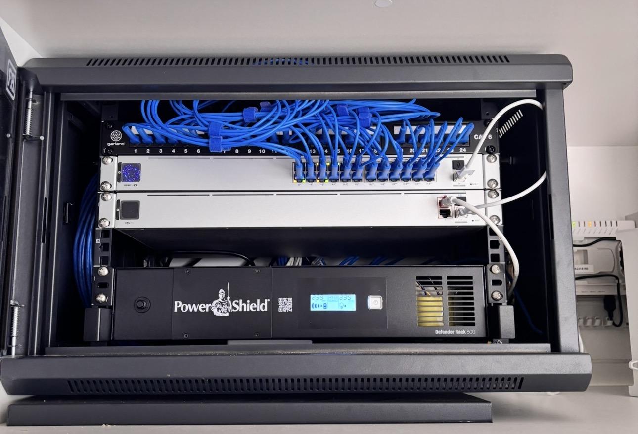 Organised patch panel, switching and rack UPS